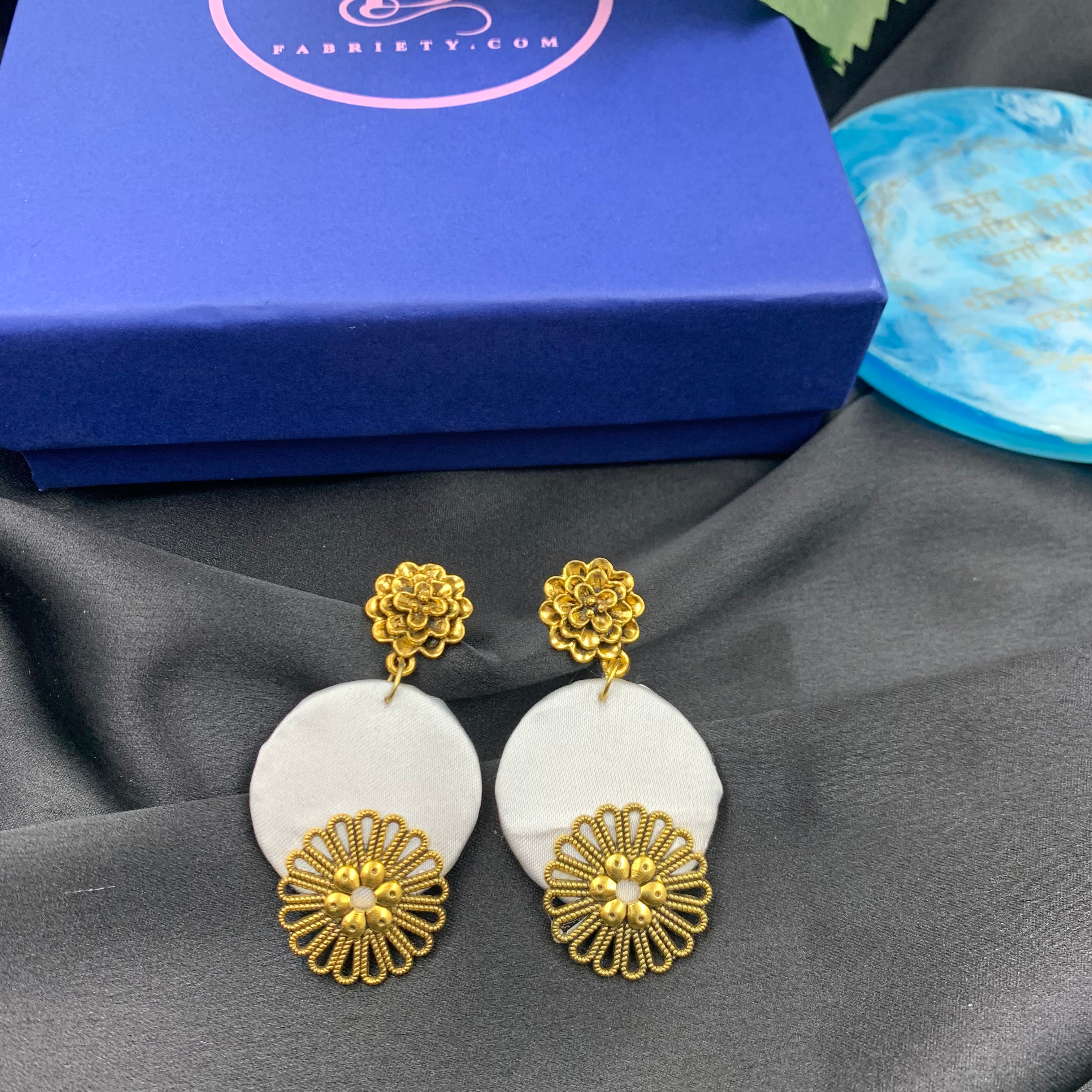 White Fabric Circular Earrings with Golden Charms